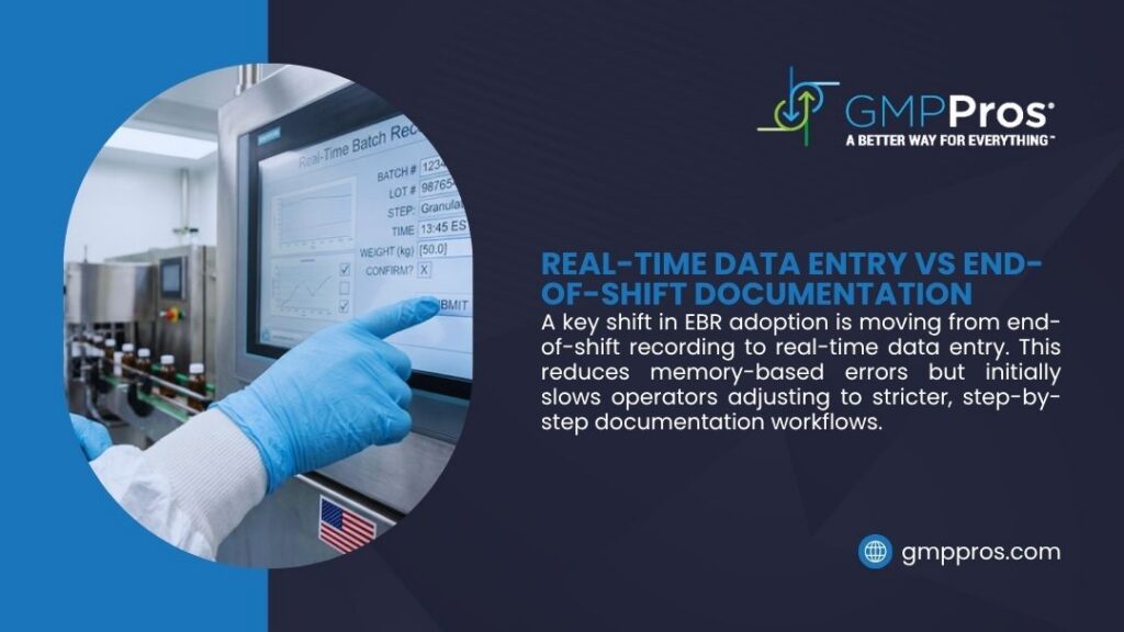 Challenges Transitioning from Paper to Electronic Batch Records: What Pharma Manufacturers Need to Know 2 Gloved hand in cleanroom lab coat pointing at touchscreen monitor displaying real-time batch record data entry interface with batch number, step, time, weight, and confirmation fields in pharmaceutical production.